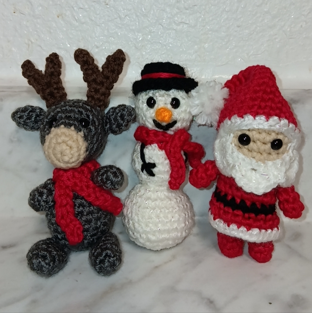 Christmas ornaments, santa, snowman, reindeer, red, white, black, brown